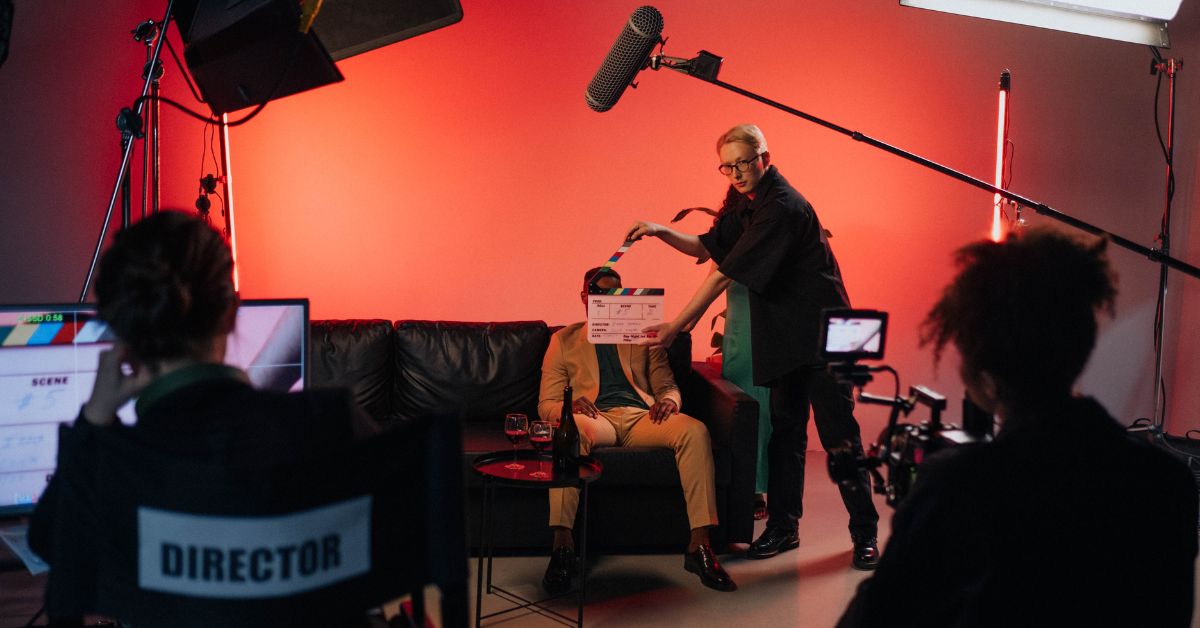 Movie set with a black character sitting ready to shoot